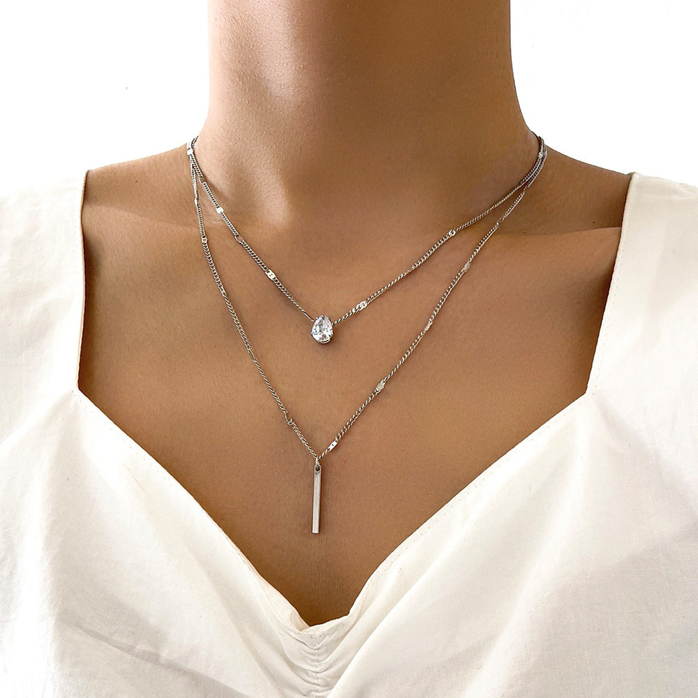 Girl wearing Small Silver Diamond Long Fringe Pendant Necklace