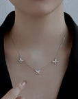 Black Dressed woman wearing S925 Sterling Silver Butterfly Necklace