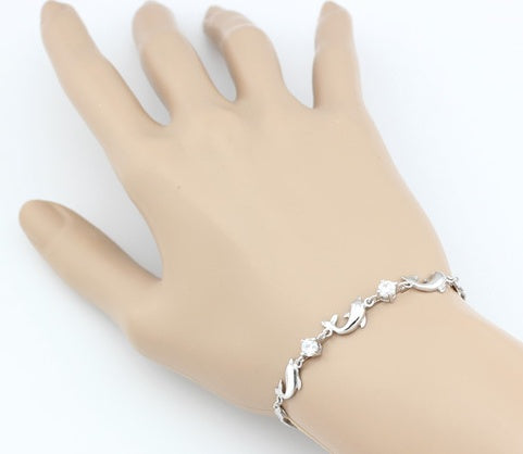 925 Sterling Silver Dolphin Bracelet on a woman's hand