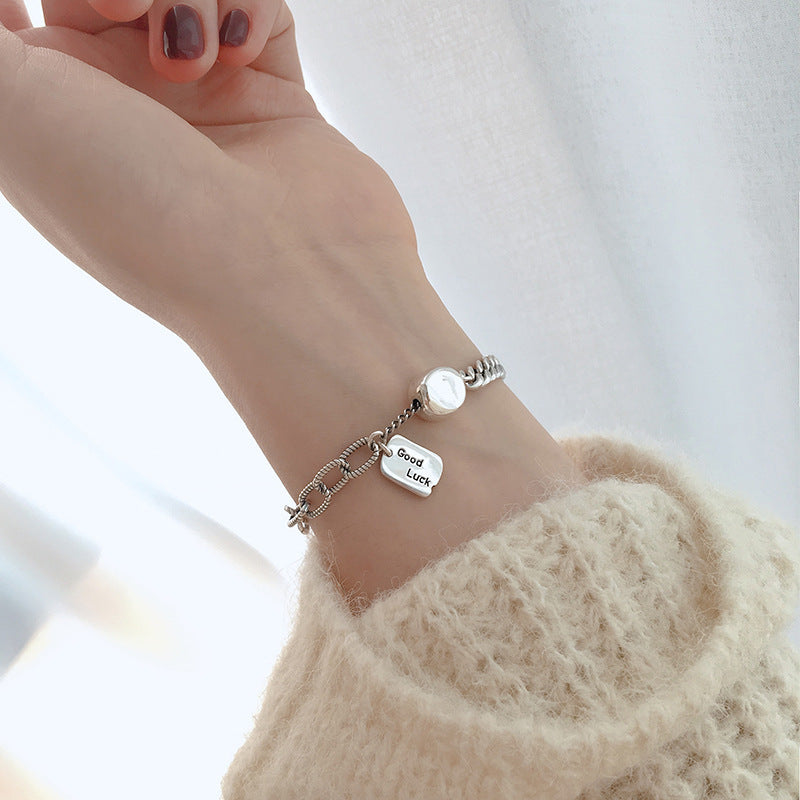 Girl wearing 925 Silver Good Luck Bracelet