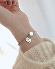 Girl wearing 925 Silver Good Luck Bracelet