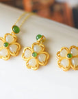 Three white pendants of Gold Green Clover Necklace