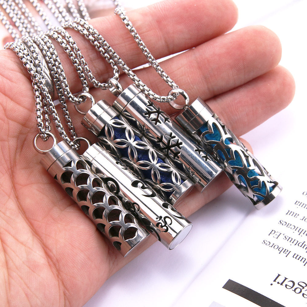 Five Cylinder Pendant Necklaces in woman's hand