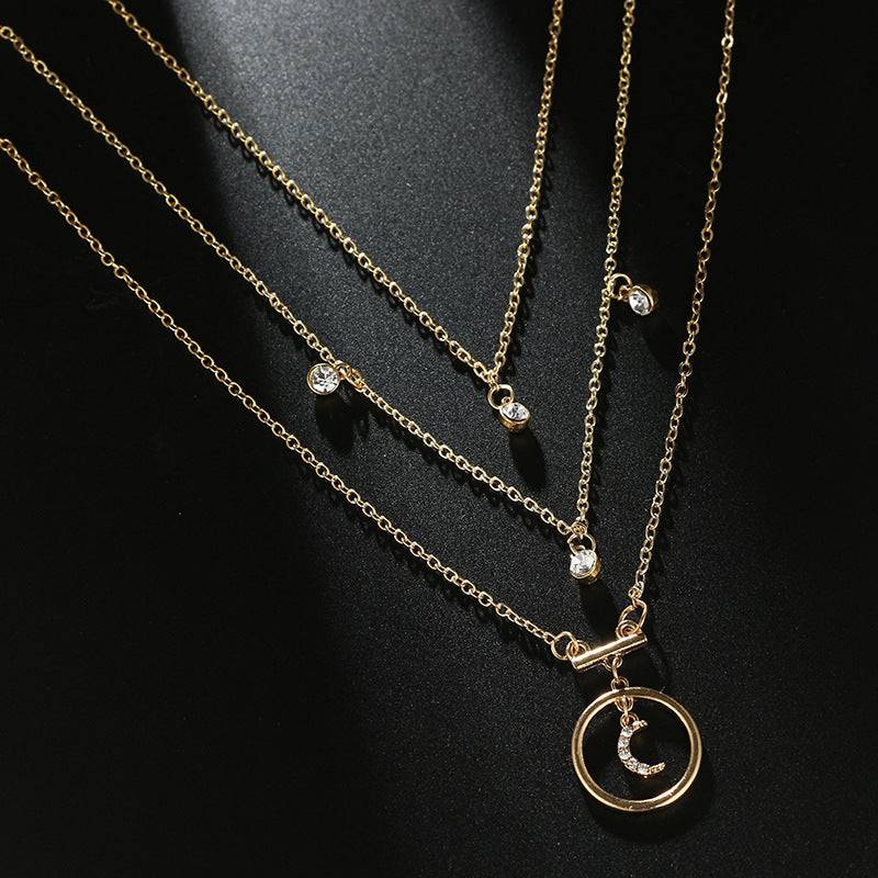 Antique Gold Circle Moon Bohemian Necklace in black background