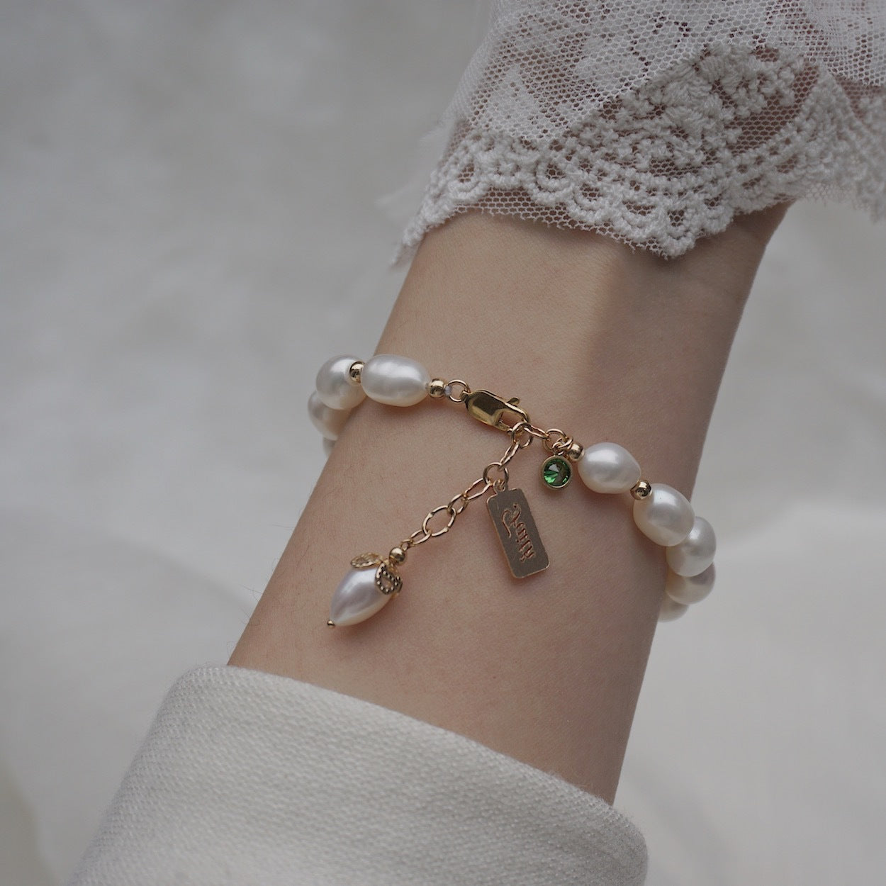 Natural Zircon Pearl Bracelet in woman's hand