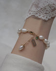 Natural Zircon Pearl Bracelet in woman's hand