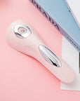 Rechargeable Mini LED UV Lamp Nail Dryer beside prada box