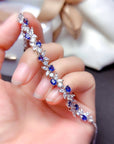 925 Sterling Silver Sapphire Bracelet in finger a lady