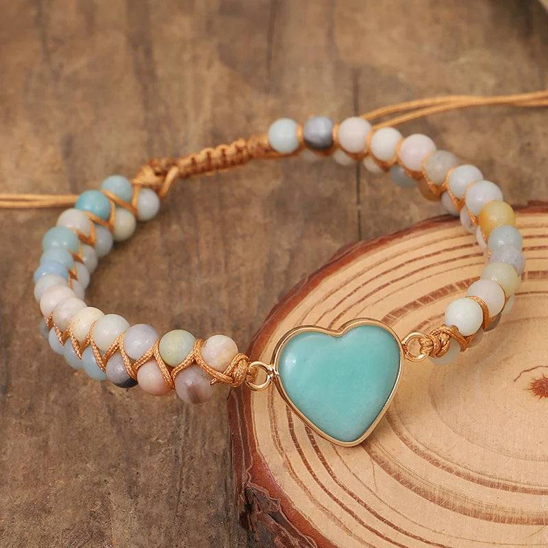 Amazonite String Braided Heart Bracelet over a wood