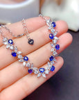 925 Sterling Silver Sapphire Bracelet in woman's palm