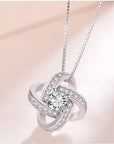 925 Sterling Silver Forever Heart Necklace in off white background