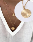 White Dressed Woman wearing Korean Gear Coin Necklace