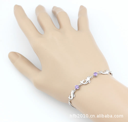 925 Sterling Silver Dolphin Bracelet on a beautiful girl's hand