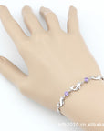 925 Sterling Silver Dolphin Bracelet on a beautiful girl's hand