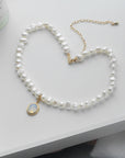 Round Beautiful Pearl Necklace over a table