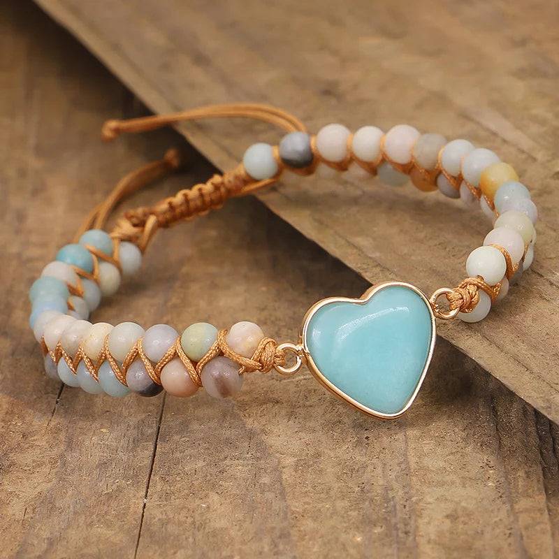 Amazonite String Braided Heart Bracelet over a table