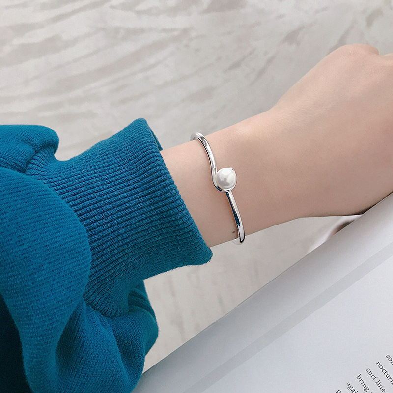 Sterling Silver Bracelet on a woman's hand