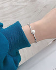 Sterling Silver Bracelet on a woman's hand