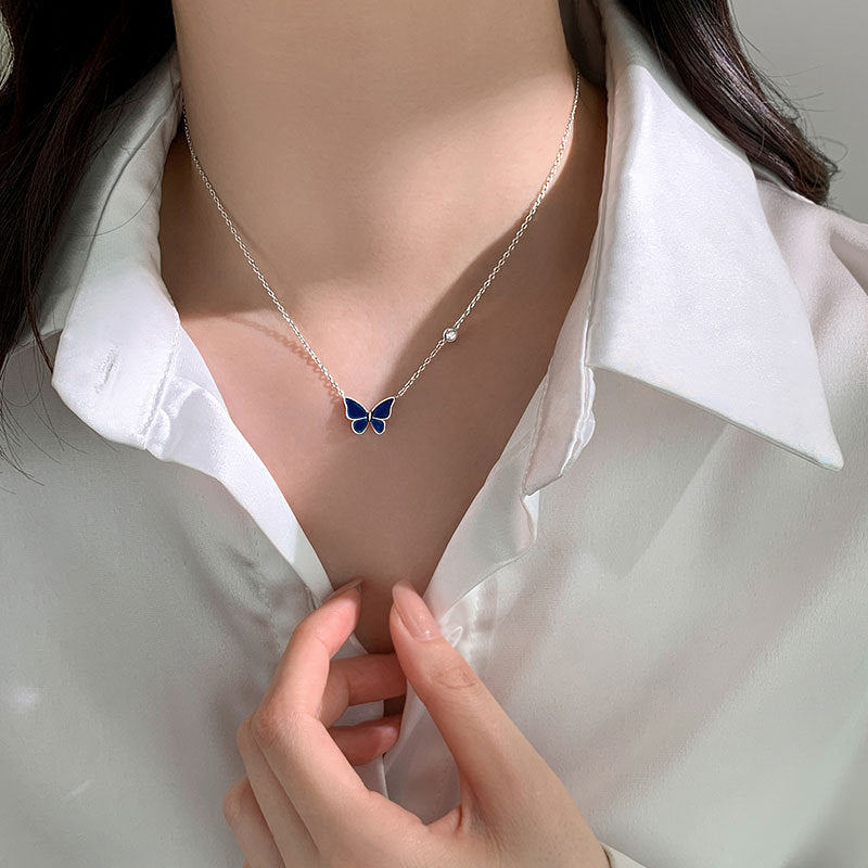 White shirt girl wearing Color-changed Enchanted Butterfly Necklace