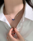 White shirt girl wearing Color-changed Enchanted Butterfly Necklace