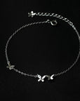 S925 Sterling Silver Butterfly Anklets for Women in black background photoshoot