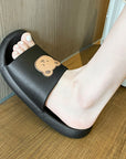 Girl wearing black colored Cute Bear Slippers Summer Beach Shoes