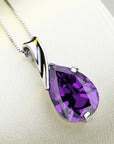 Sweet Purple Crystal Necklace over white cushion