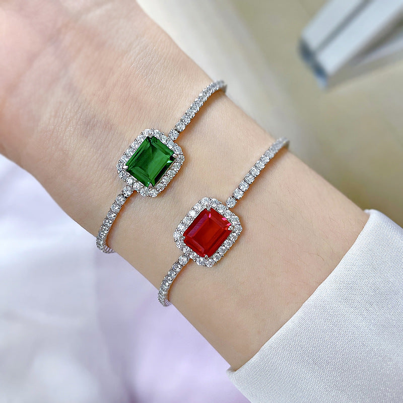 Two S925 Sterling Silver Emerald Bracelets on girl's hand