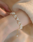 Korean Cat Claw Pearl Bracelet in woman's hand