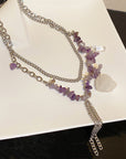 Korean Purple Stone Necklace over White Table