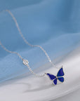 Deep Blue Color-changed Enchanted Butterfly Necklace over the bed