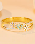 Little Daisy Gold Bracelet in yellow background