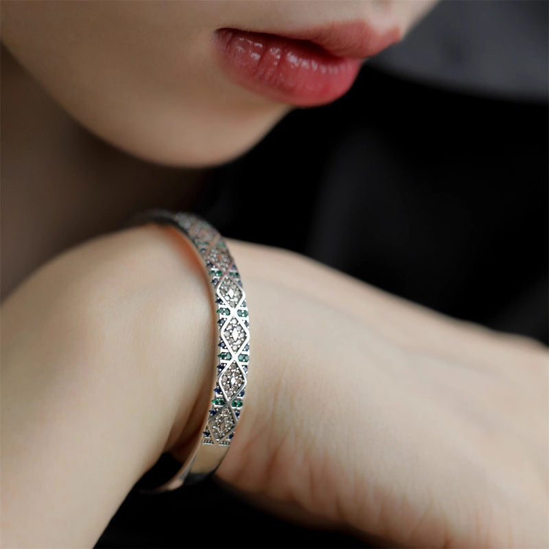 Silver Color Sparkling Zircon Bracelet in hand of black dressed lady