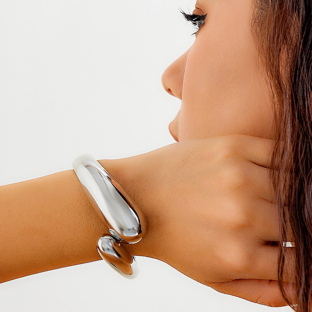 Glossy Water Drop Bracelet in beautiful lady's hand