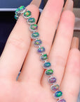 Natural Black Opal Bracelet in beautiful woman's hand