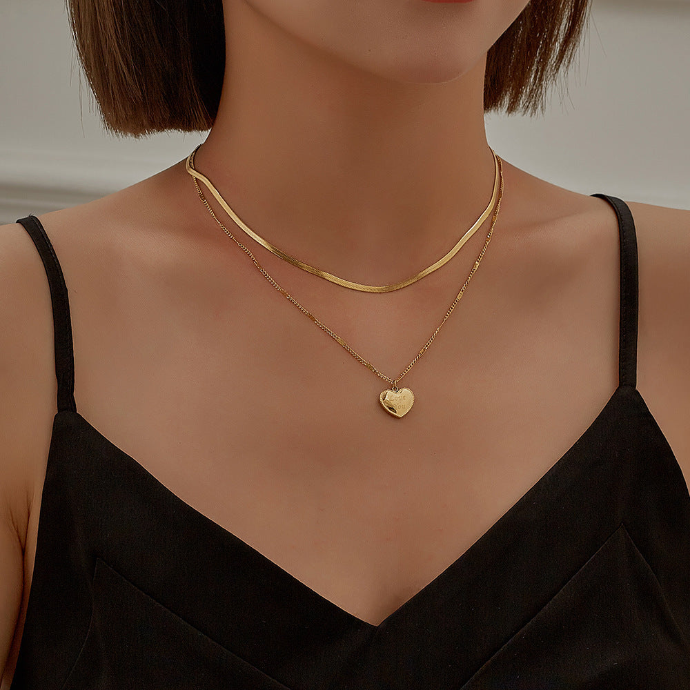 Black dressed woman wearing Luxury Love Necklace Gold for Women