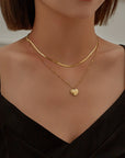 Black dressed woman wearing Luxury Love Necklace Gold for Women