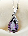 Sweet Purple Crystal Necklace over cusion