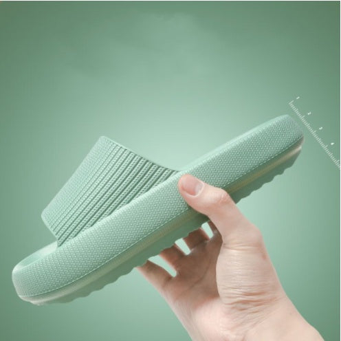 Man holding Hot Summer Cute Super Soft Slippers For Women Men