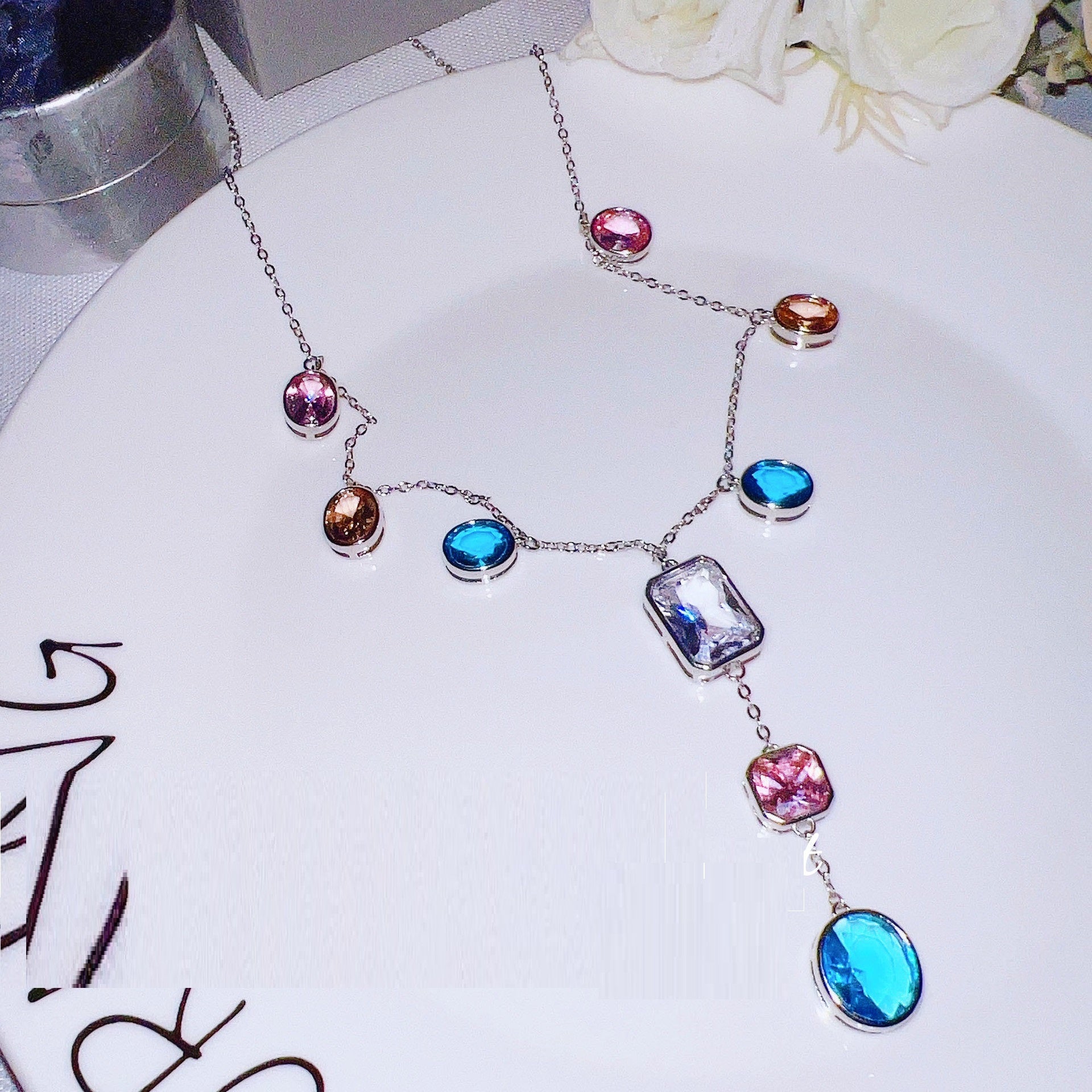 Multi Gemstone Necklace for Women over a white plate