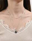 white top girl wearing Metal Silver Round Necklace